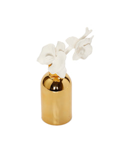 Gold Bottle Diffuser With Gold Cap And White Flower
